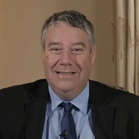 Prof John Buscombe